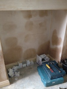 dampness-through-dry-lining-to-fireplace-225x300